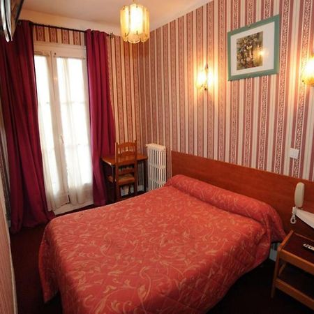 Sully Hotel Париж Номер фото